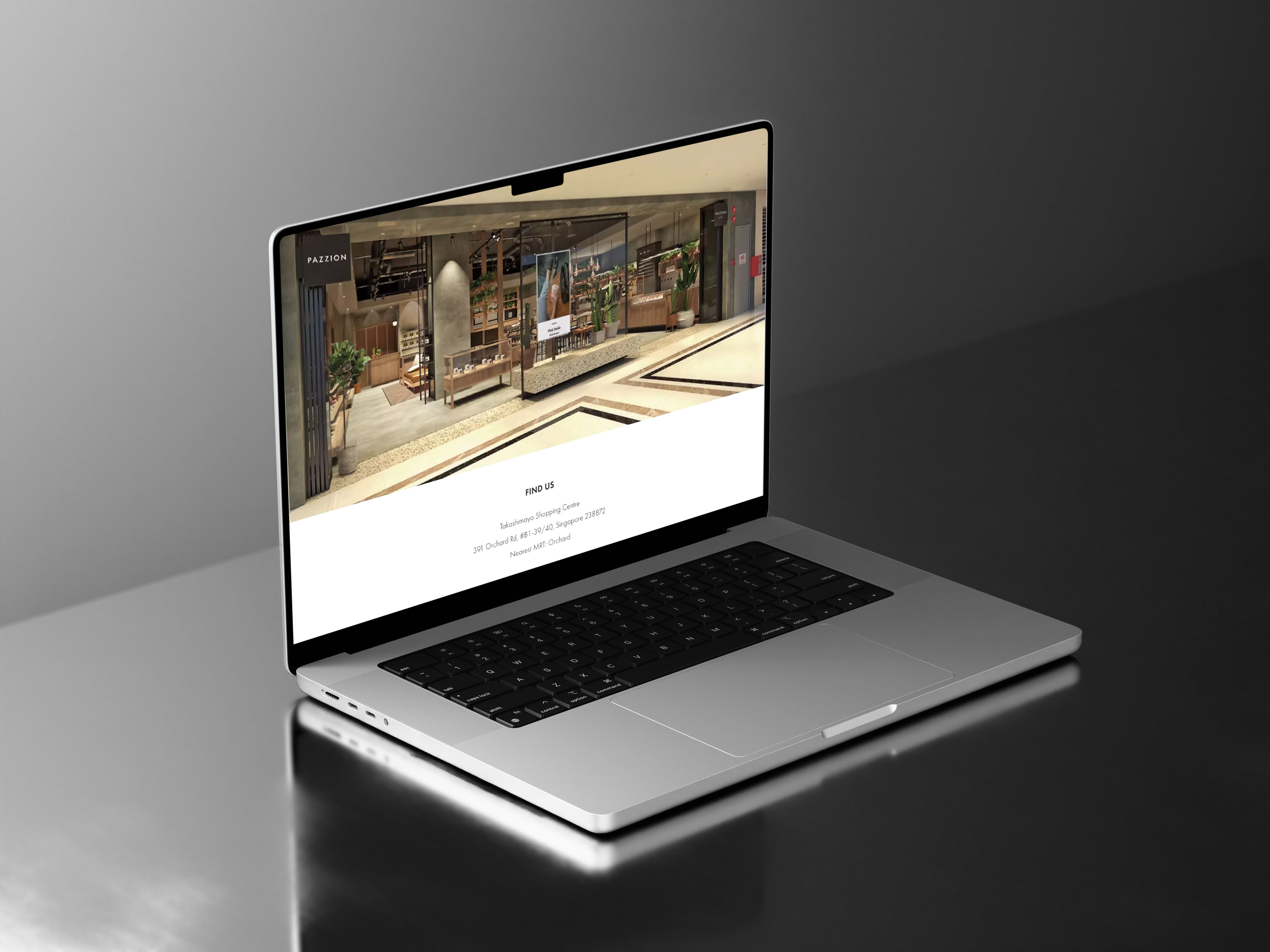 Pazzion Café website Find Us section on a laptop, with a store interior photo and the Takashimaya address